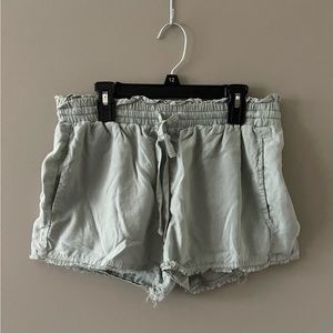 Cloth and Stone sage green dress shorts.